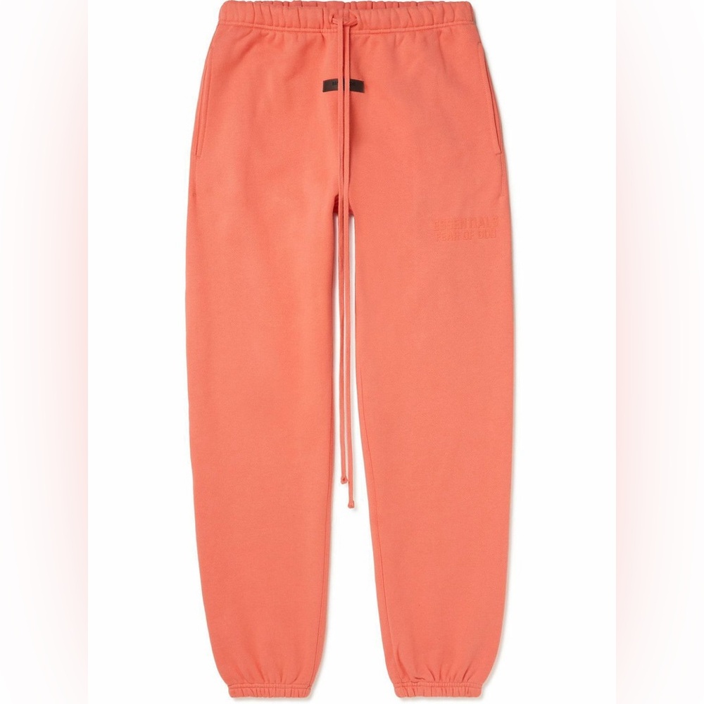 FEAR OF GOD ESSENTIALS - Tapered Logo Blend Jersey Sweatpants in Coral - Picture 2 of 11